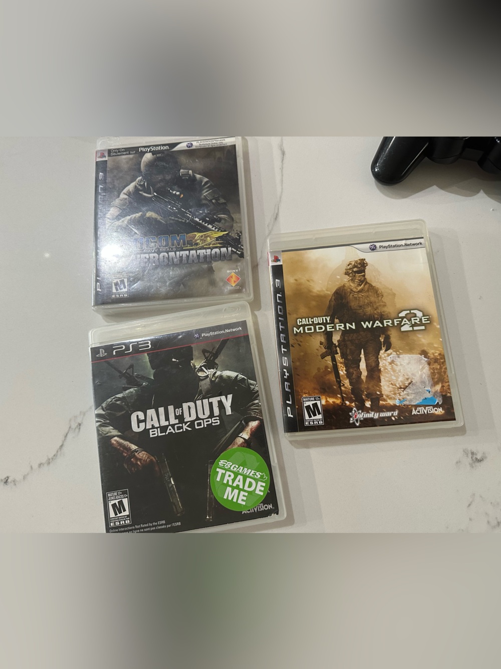 Sony Black PS3 Slim Console with Wired DualShock Controller and Game Discs - Picture 5 of 11